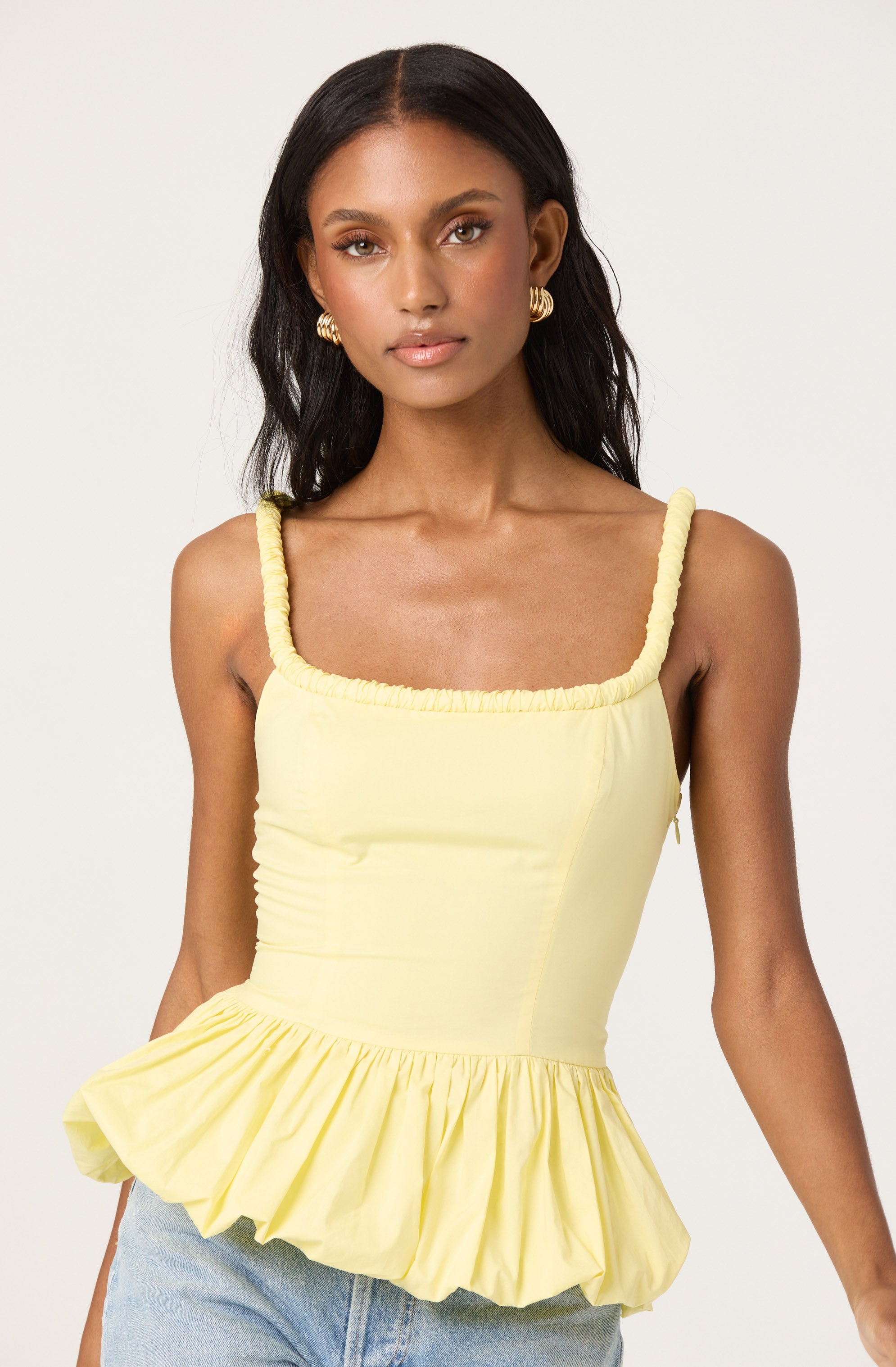 Sleeveless Bubble Hem Peplum Top